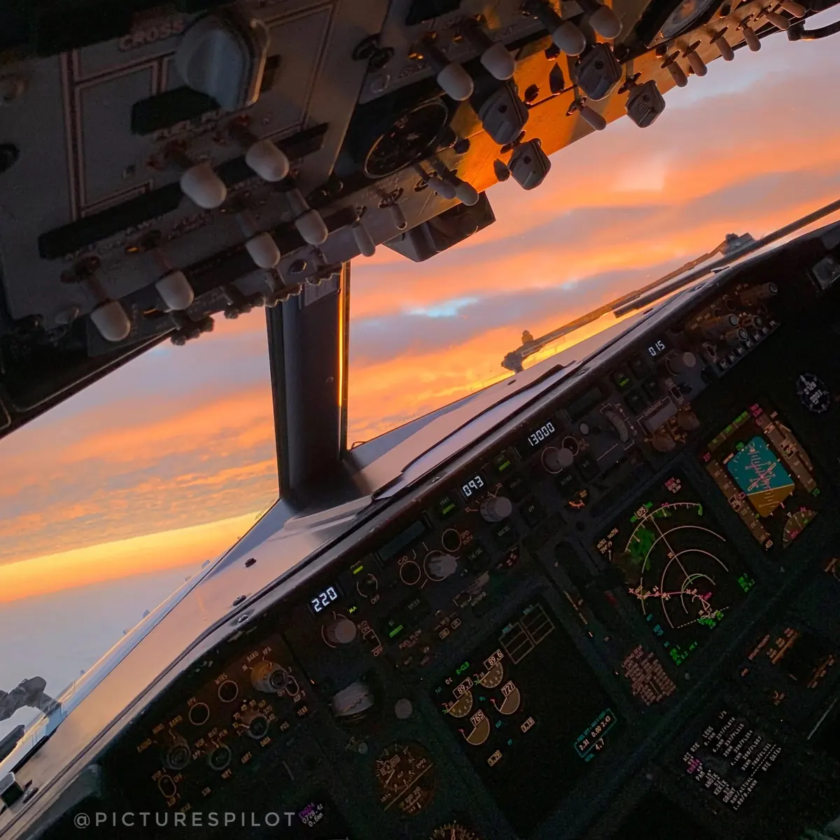 Boeing 737 cockpit at golden dusk