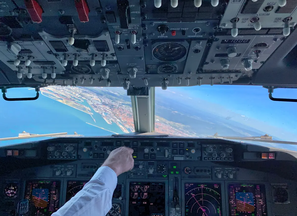 Cockpit view from the jumpseat with the mode control panel in the foreground